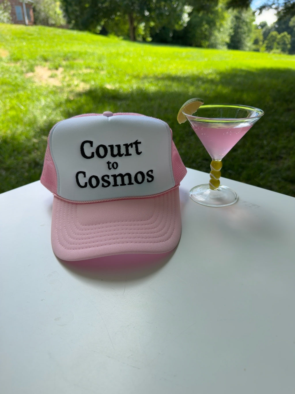 Court to Cosmos trucker hat